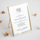 Bar menu sign with gold frame on a light background