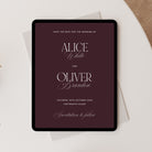 Digital tablet displaying a wedding save-the-date invitation with a dark purple background.