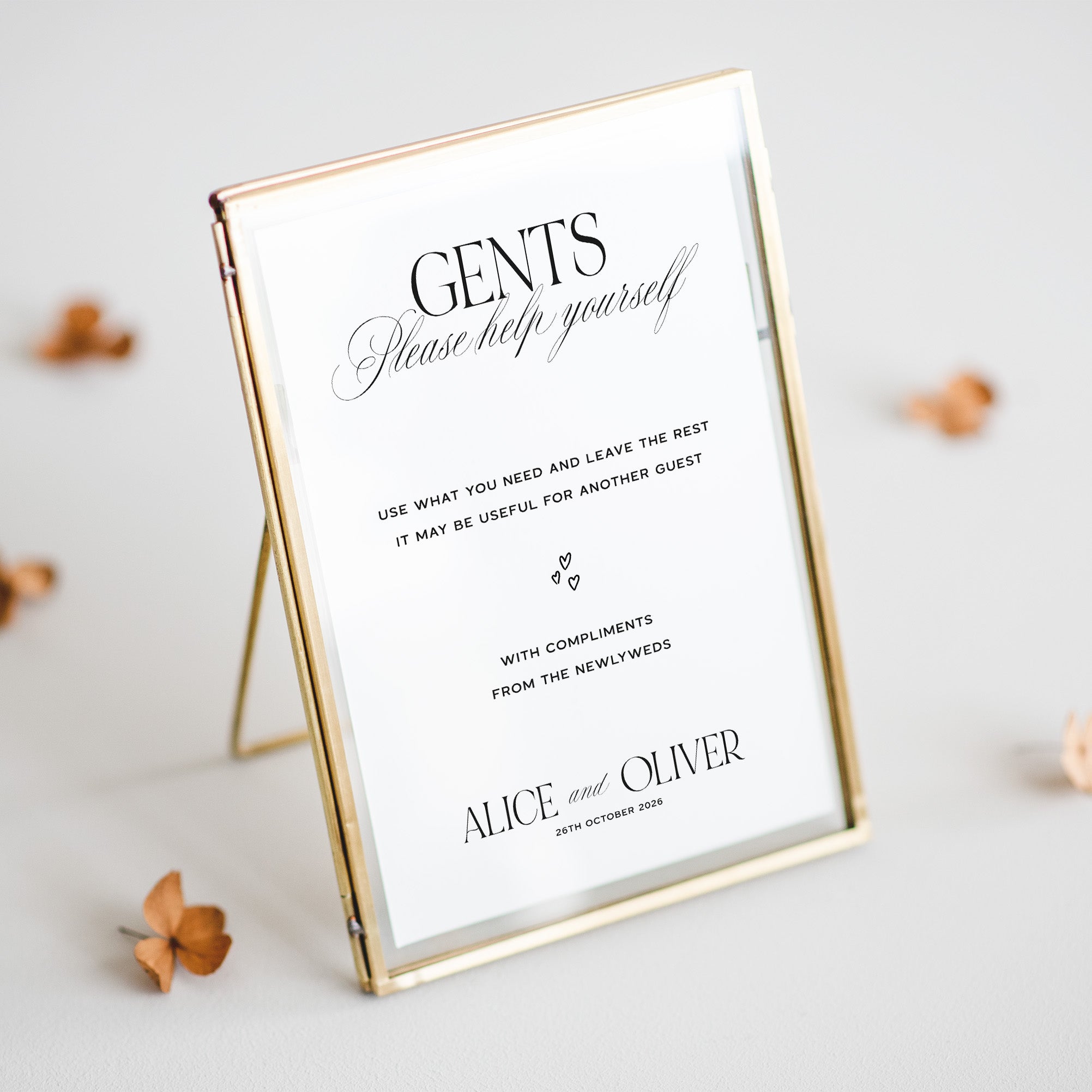 Gents sign for a wedding with gold frame on a light background