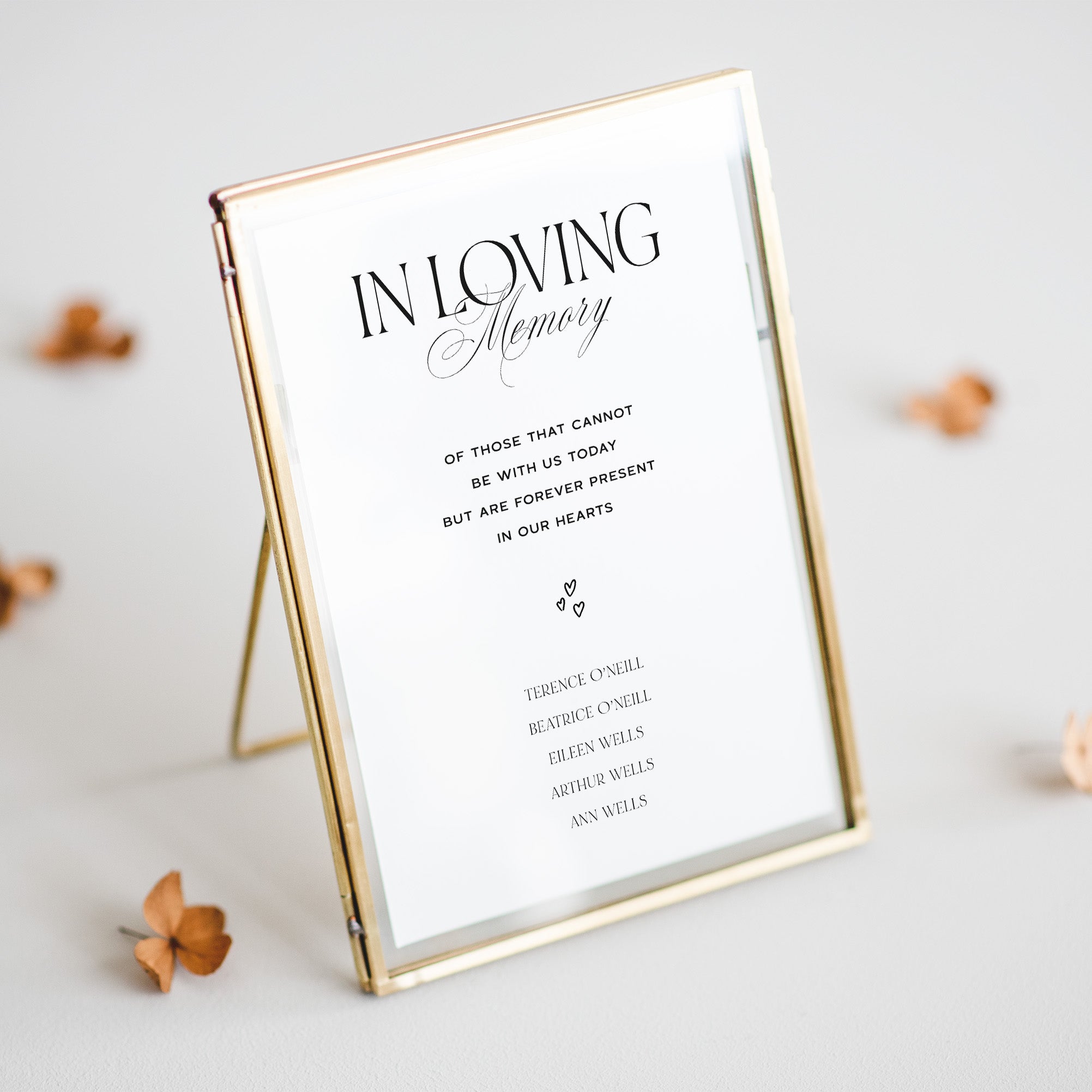 Memorial plaque with 'In Loving Memory' text on a white background