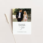 Wedding thank you card with a photo of a couple and 'Thank You' text.