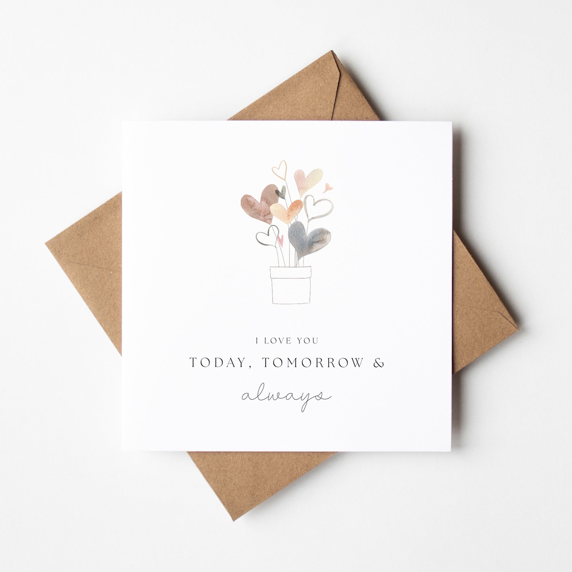 Greeting card with heart design and envelope on a white background