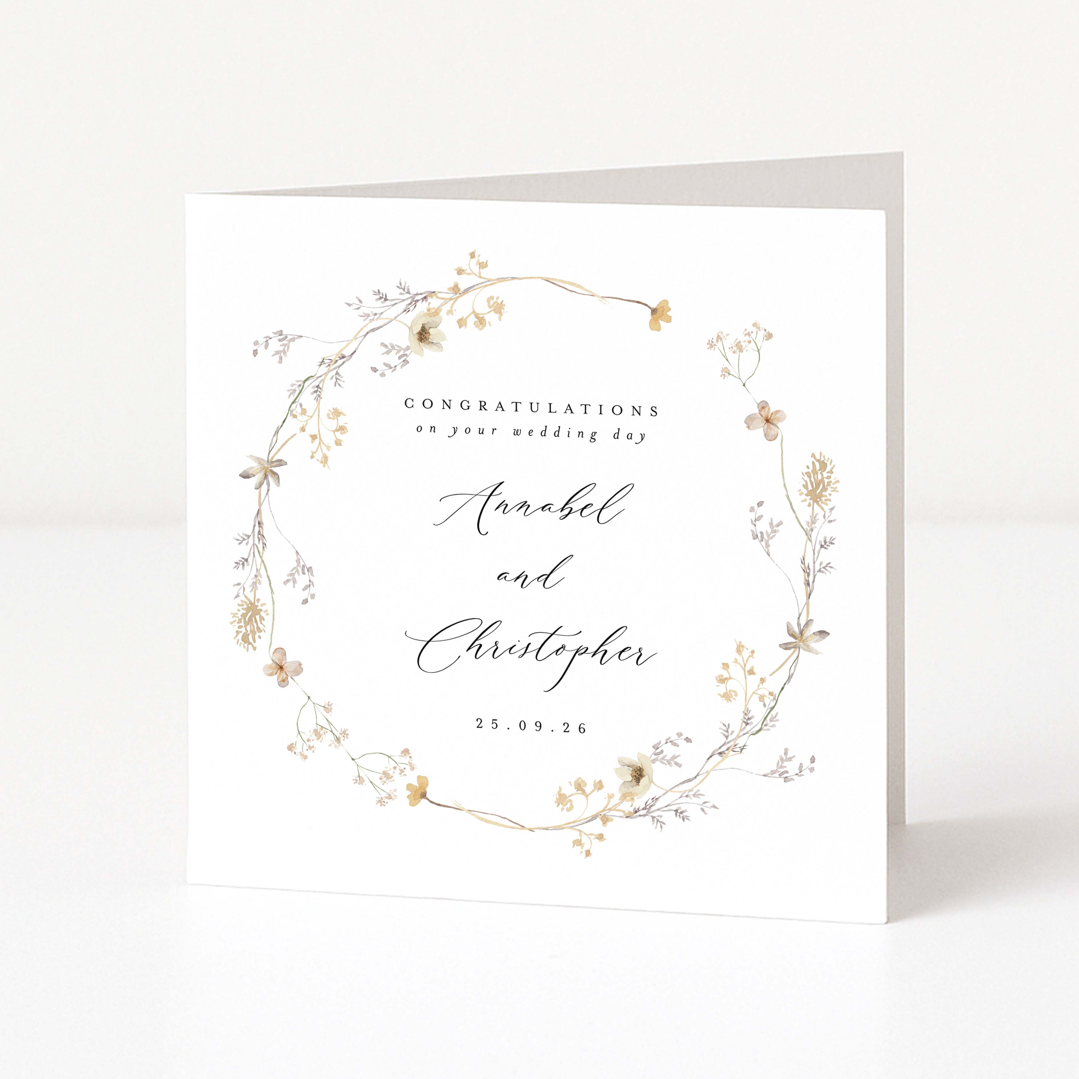 Wedding card with floral design and personalized text on a white background