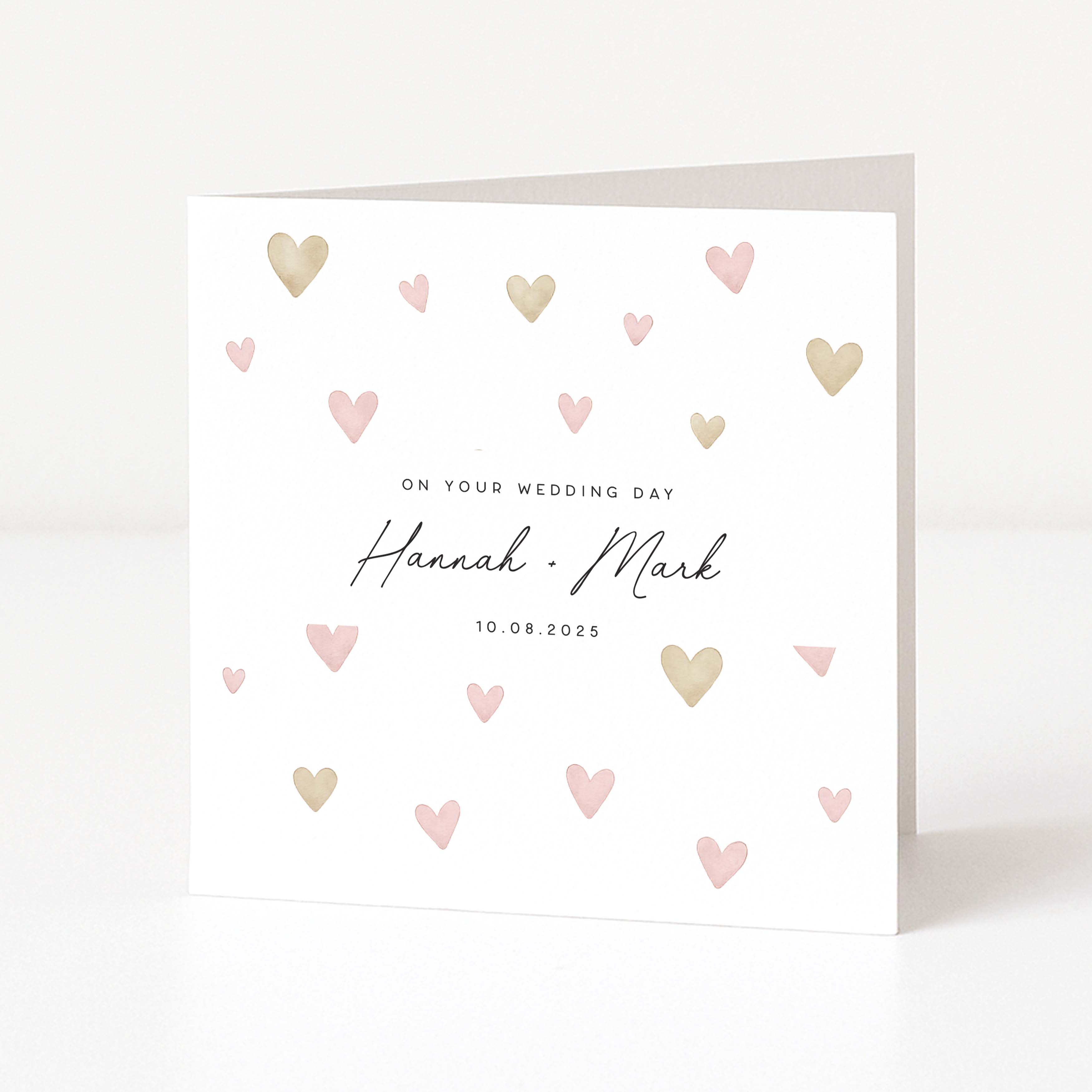 Wedding card with heart designs and personalized text on a white background