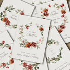 Set of Christmas cards with floral designs and text.