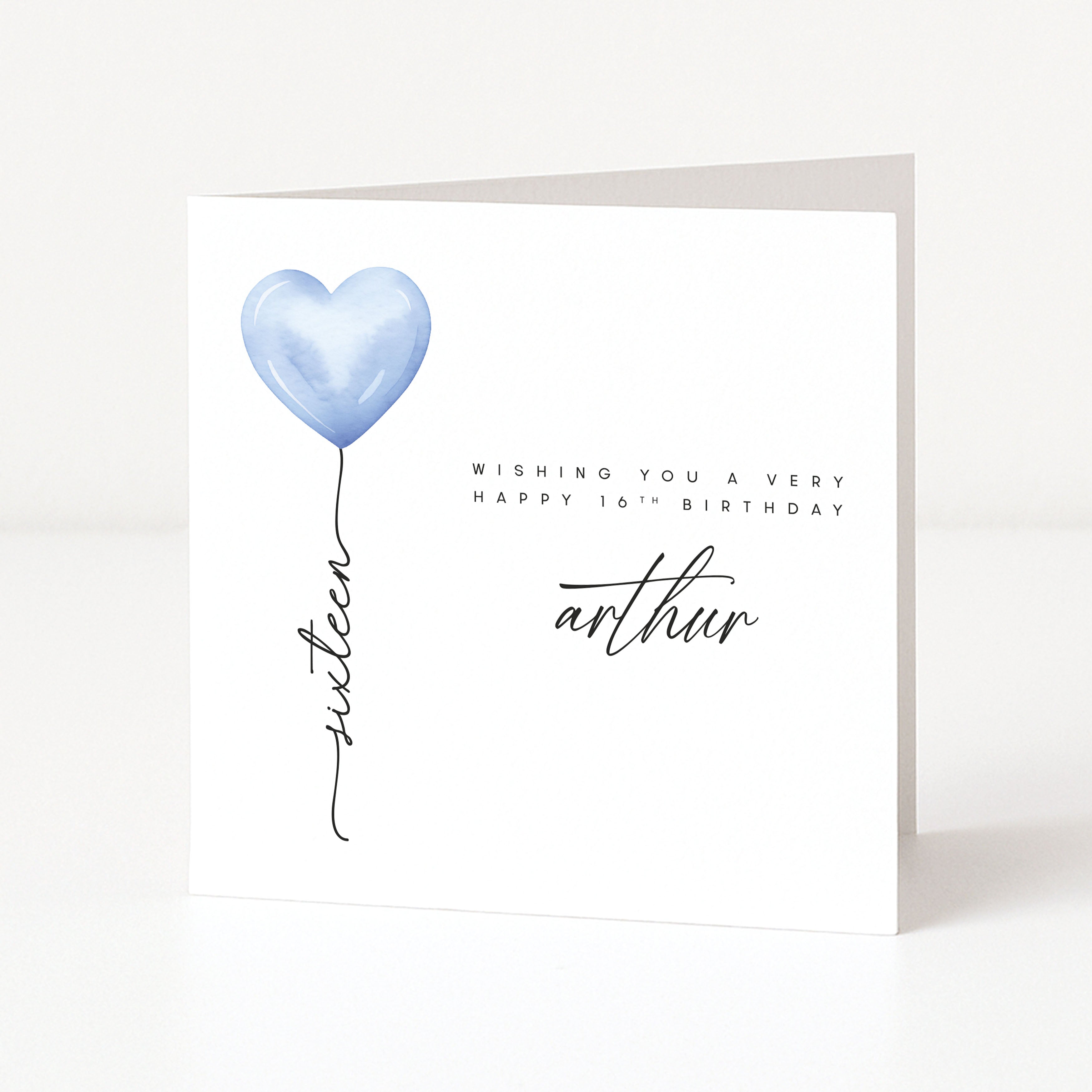 Greeting card with blue heart balloon and personalized text on a white background
