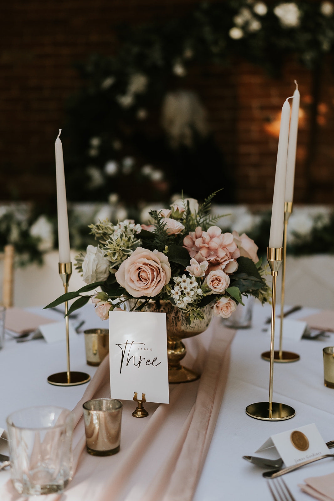 White, Nude and greenery wedding decor within an orangery