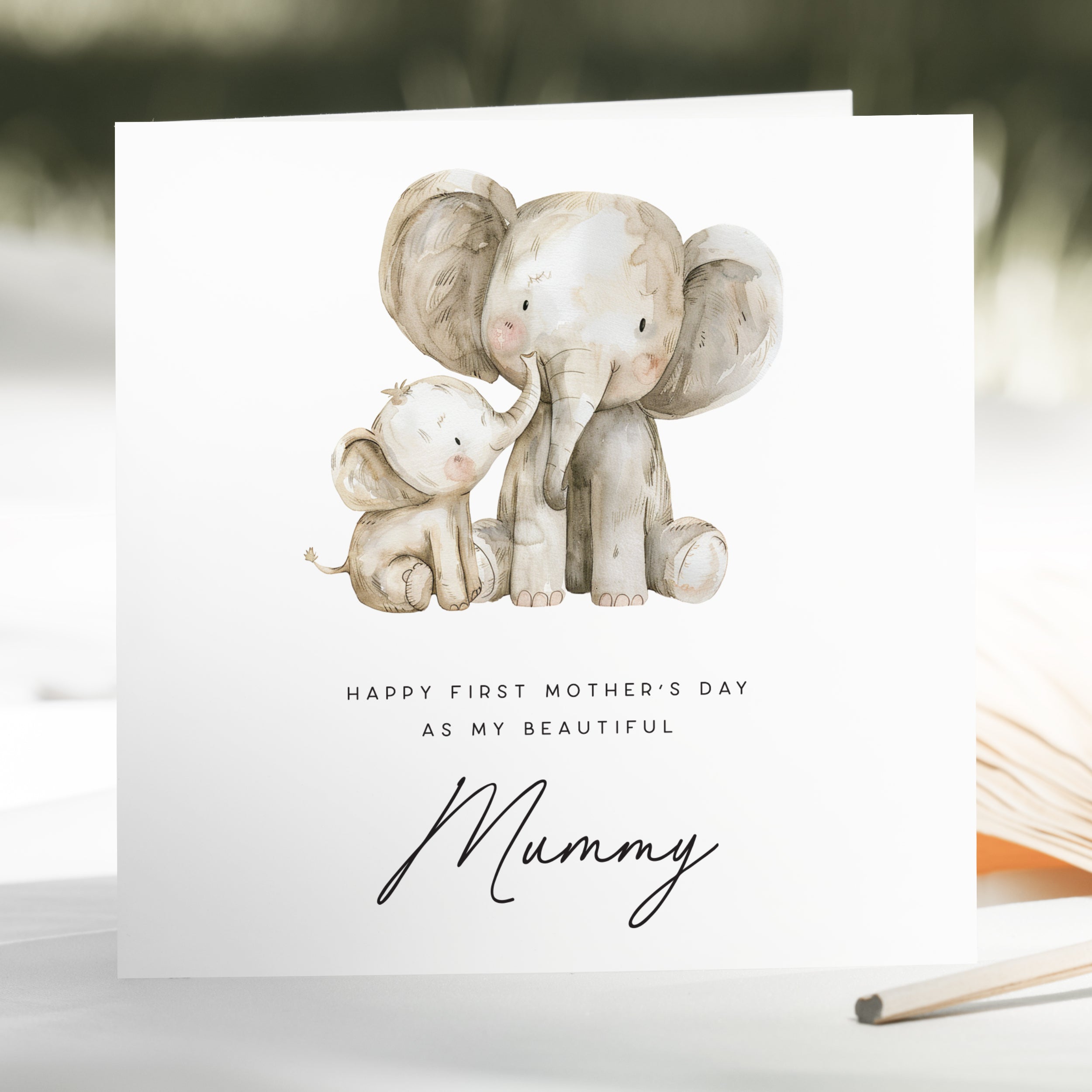 Greeting card with illustration of two elephants and text on a white background