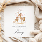 Greeting card with deer illustration and text on a soft fabric background