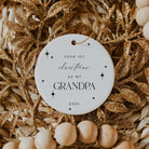 Decorative ornament with 'Your 1st Christmas as my Grandpa 2025' text on a gold and beige background.
