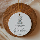 Decorative ornament with a unicorn illustration and text on a wooden base.