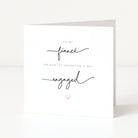 Greeting card with 'To my fiancé on our 1st Valentine's Day, engaged' text on a white background