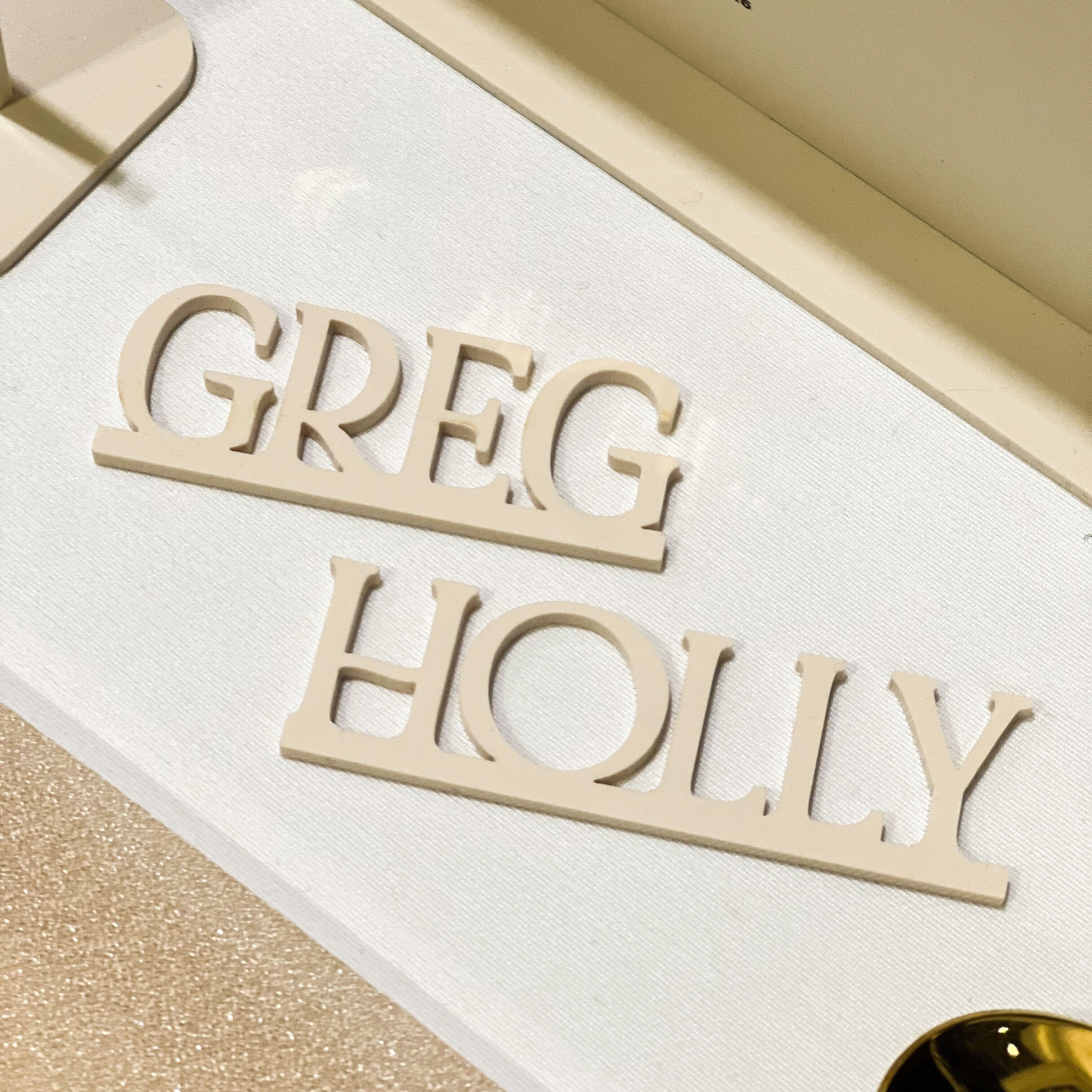 3D laser cut acrylic place names for wedding, christmas, birthday shown in champagne