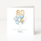 Personalised 80th birthday card for Mike with gold 80 balloons and a blue watercolour balloon bouquet.