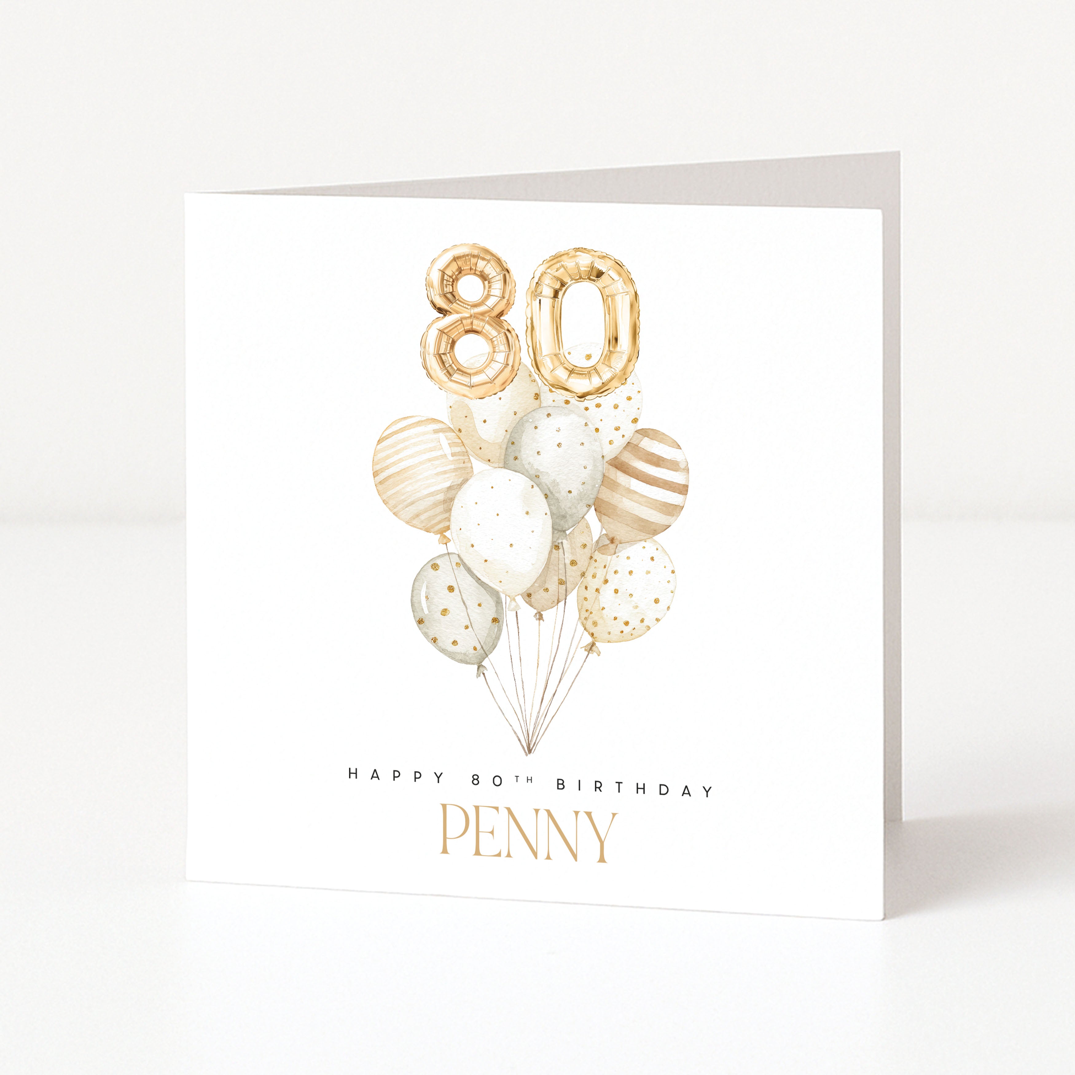 Personalised 80th birthday card for Penny with gold 80 balloons and a neutral watercolour balloon bouquet.
