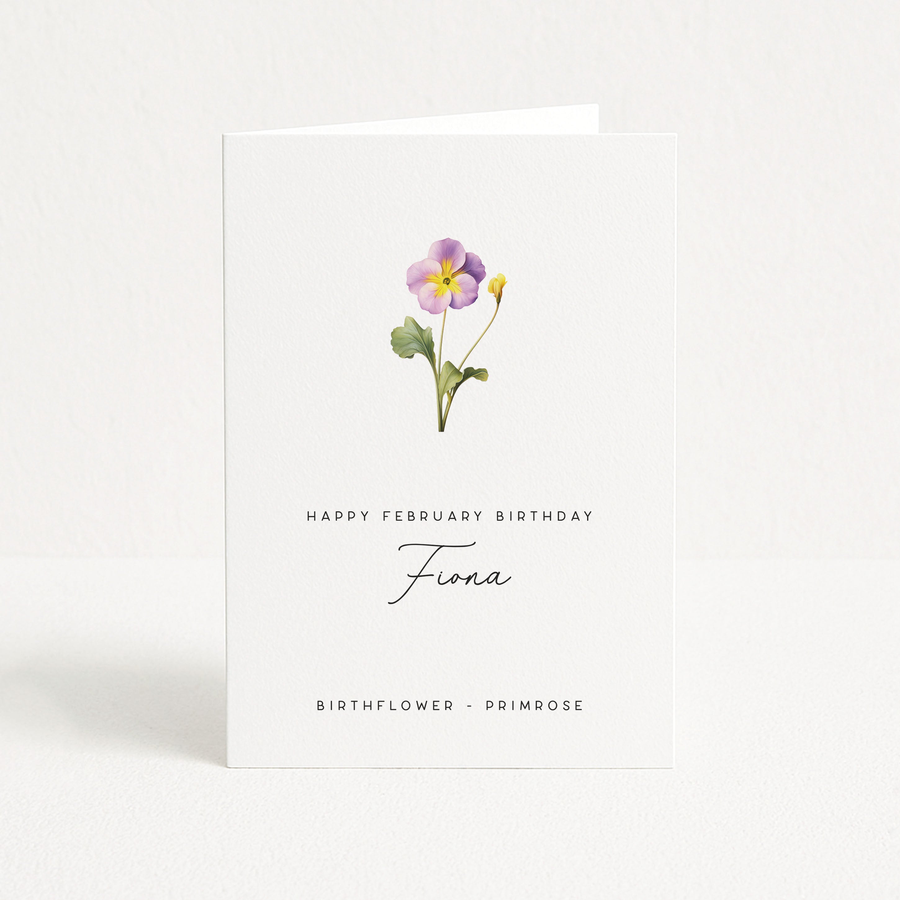 Greeting card with a primrose flower illustration and text for February birthday on a white background