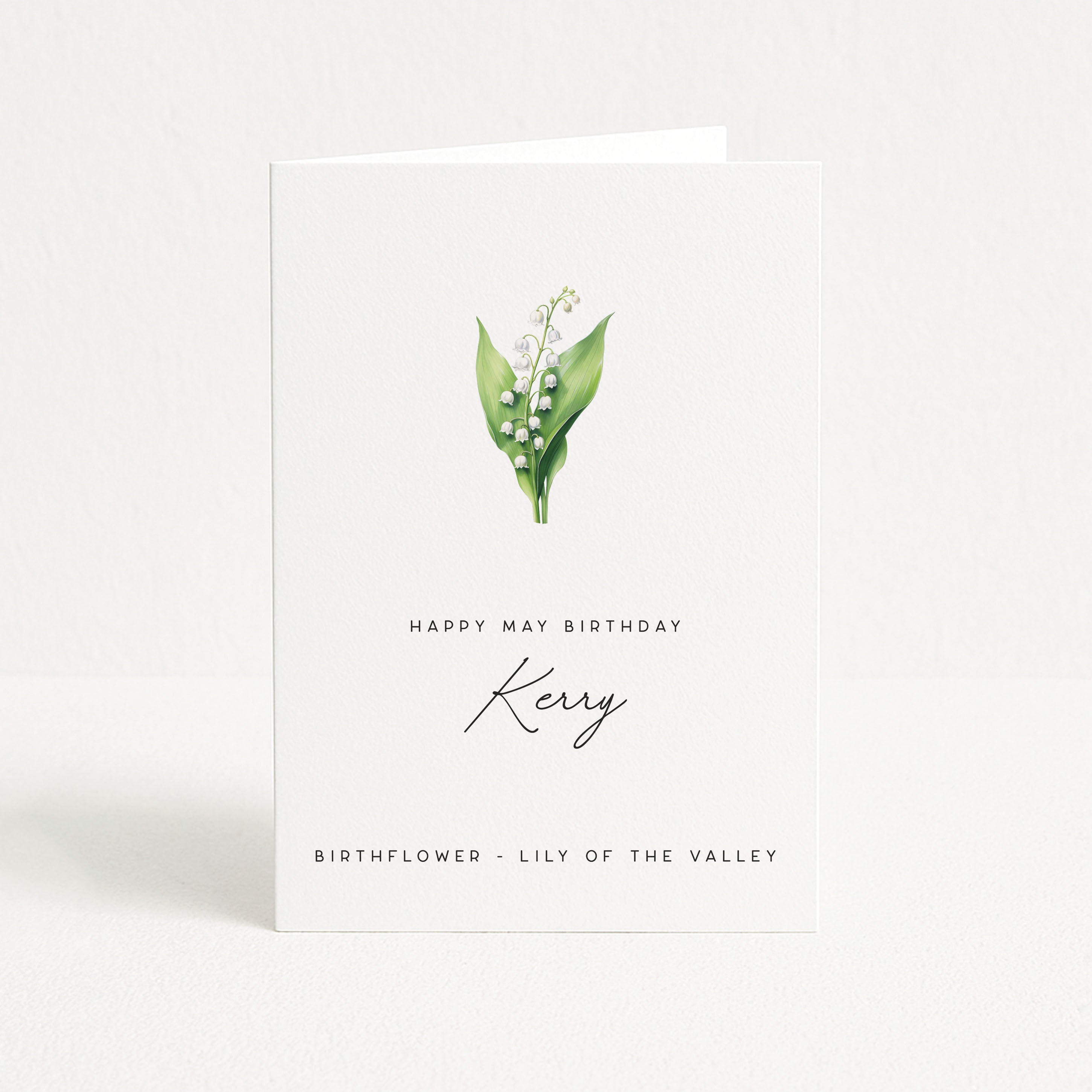 Greeting card with lily of the valley design and text on a white background