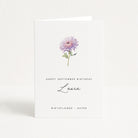 Greeting card with a purple aster flower and text for a September birthday, on a white background.