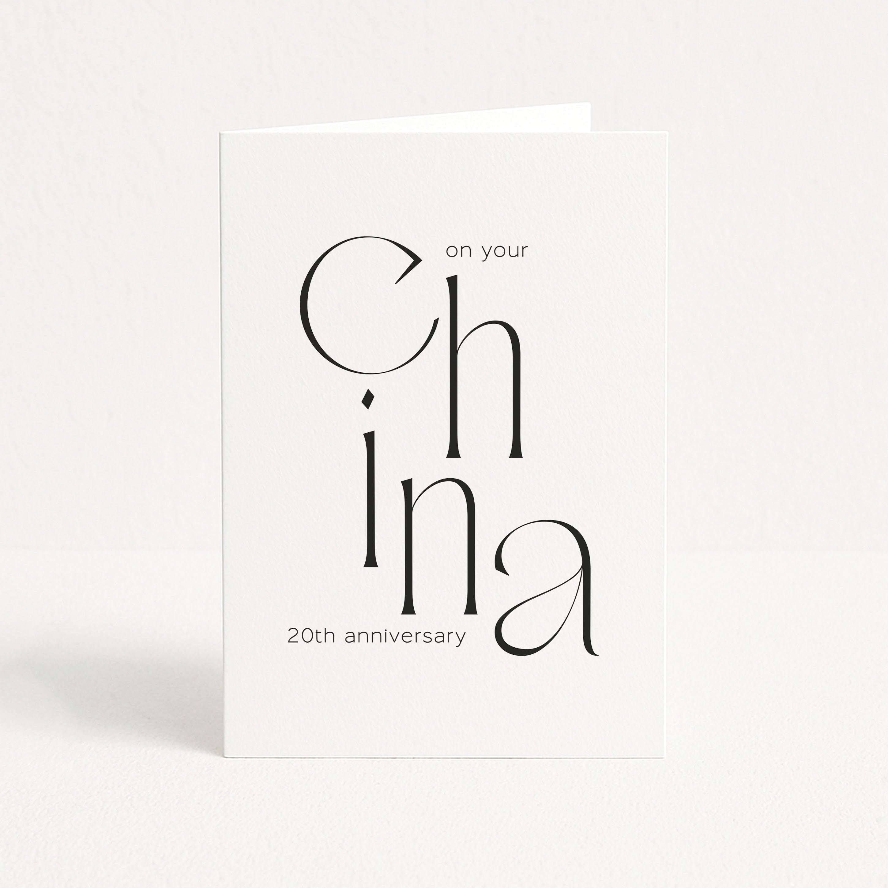 Card with 'On your 20th anniversary, China' text on a white background