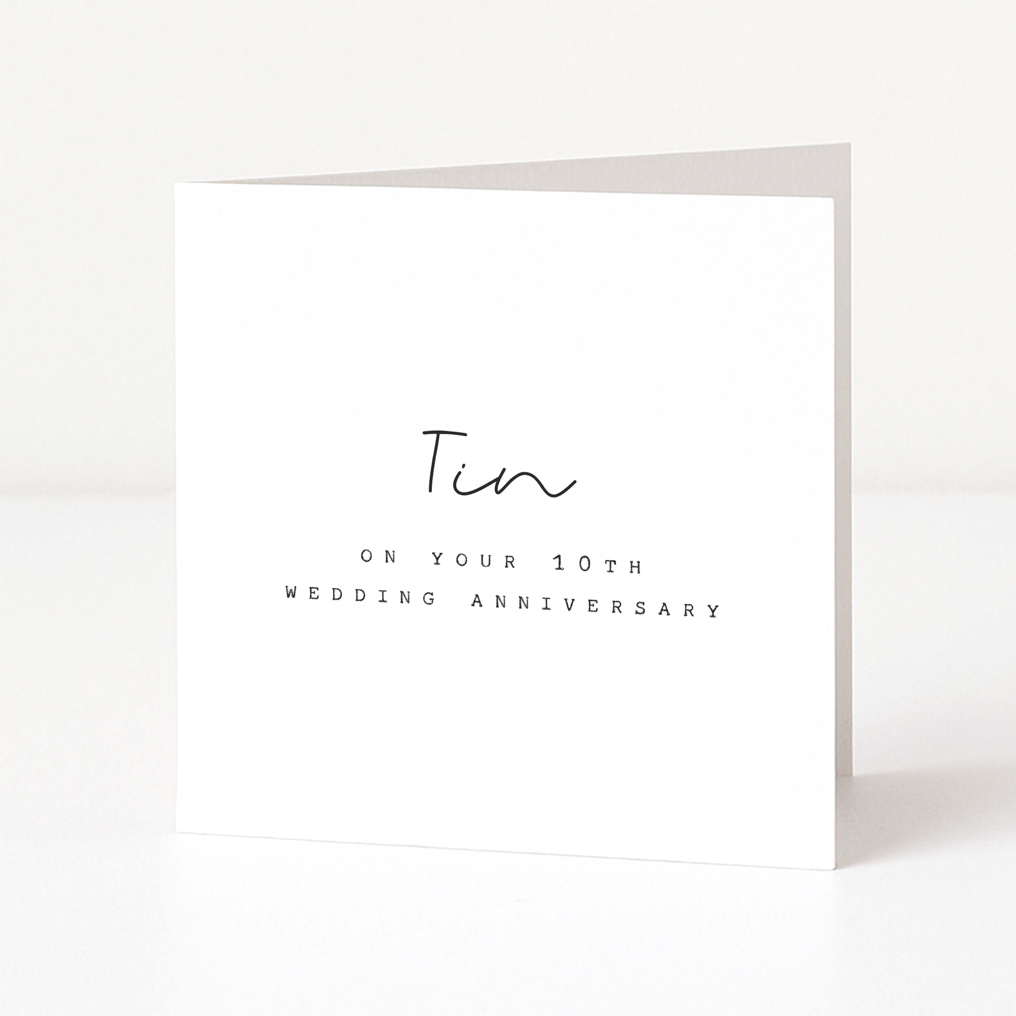 Greeting card with 'Tin on your 10th wedding anniversary' text on a white background