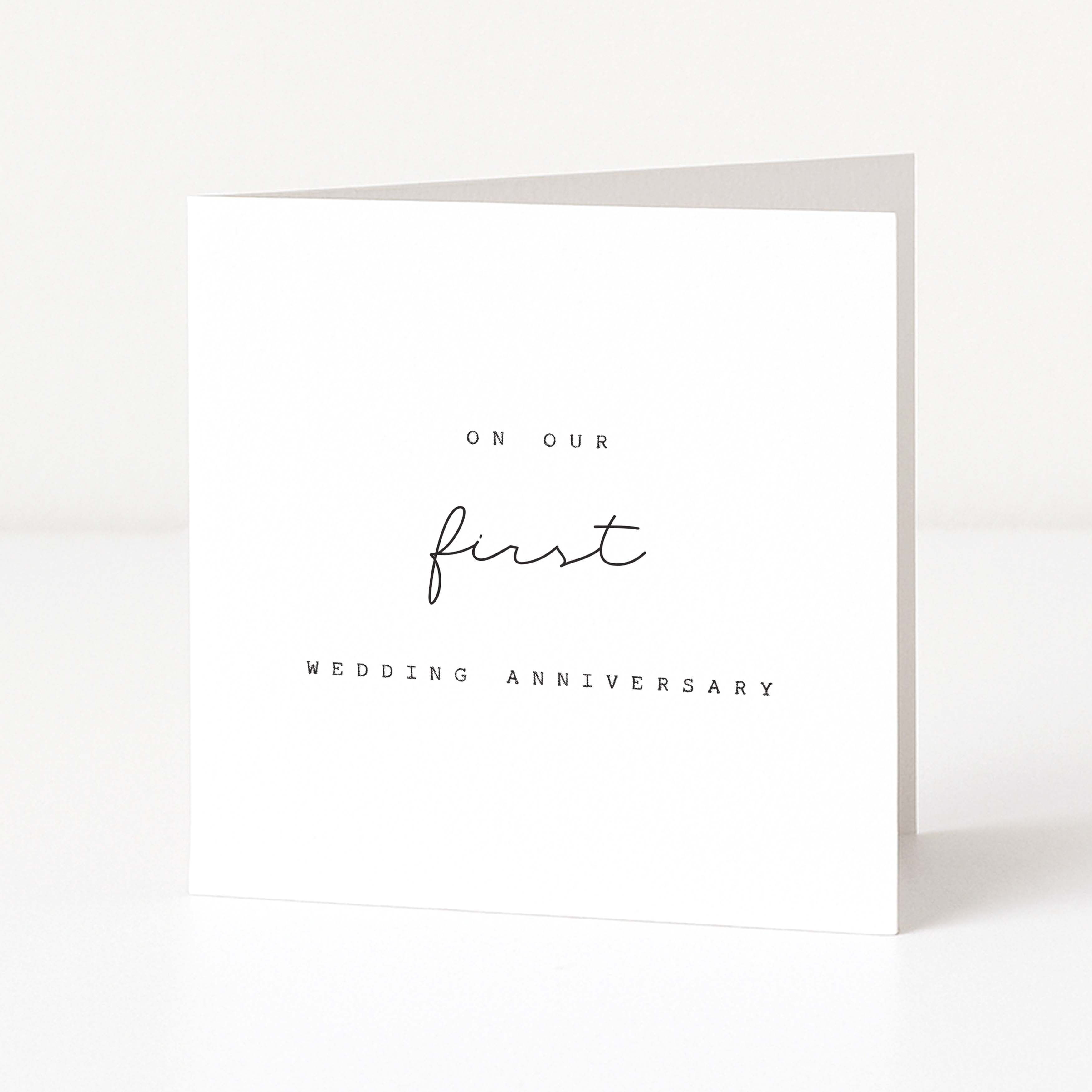 Greeting card with 'On Our First Wedding Anniversary' text on a white background