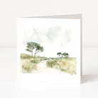 Greeting card with a scenic illustration of trees and a path on a white background