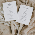 winter theme wedding paddle fans with wooden sticks on natural background