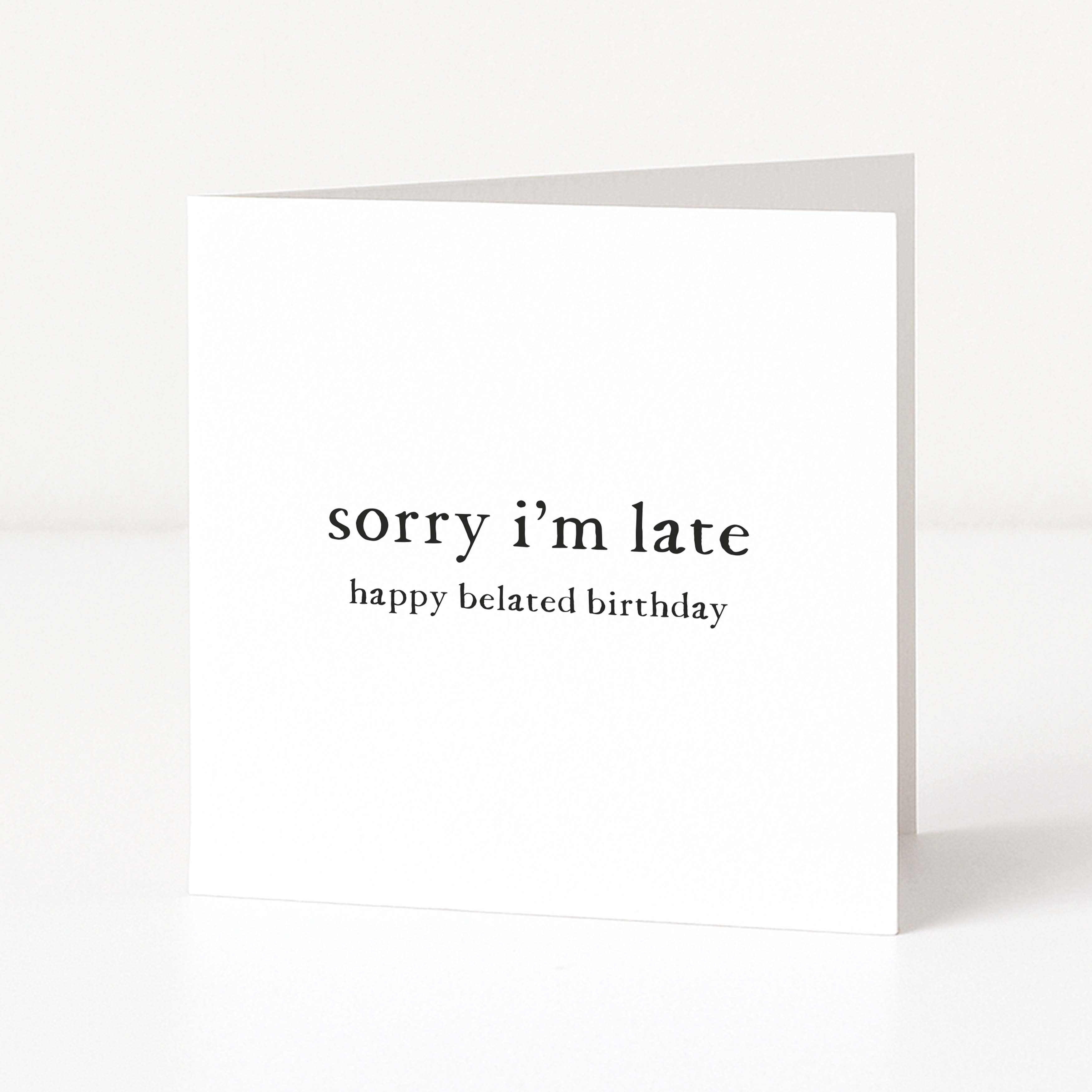 Greeting card with 'sorry i'm late happy belated birthday' text on a white background