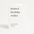 Greeting card with 'belated birthday wishes' text on a white background