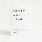 Greeting card with text 'sorry i'm a shit friend' on a white background