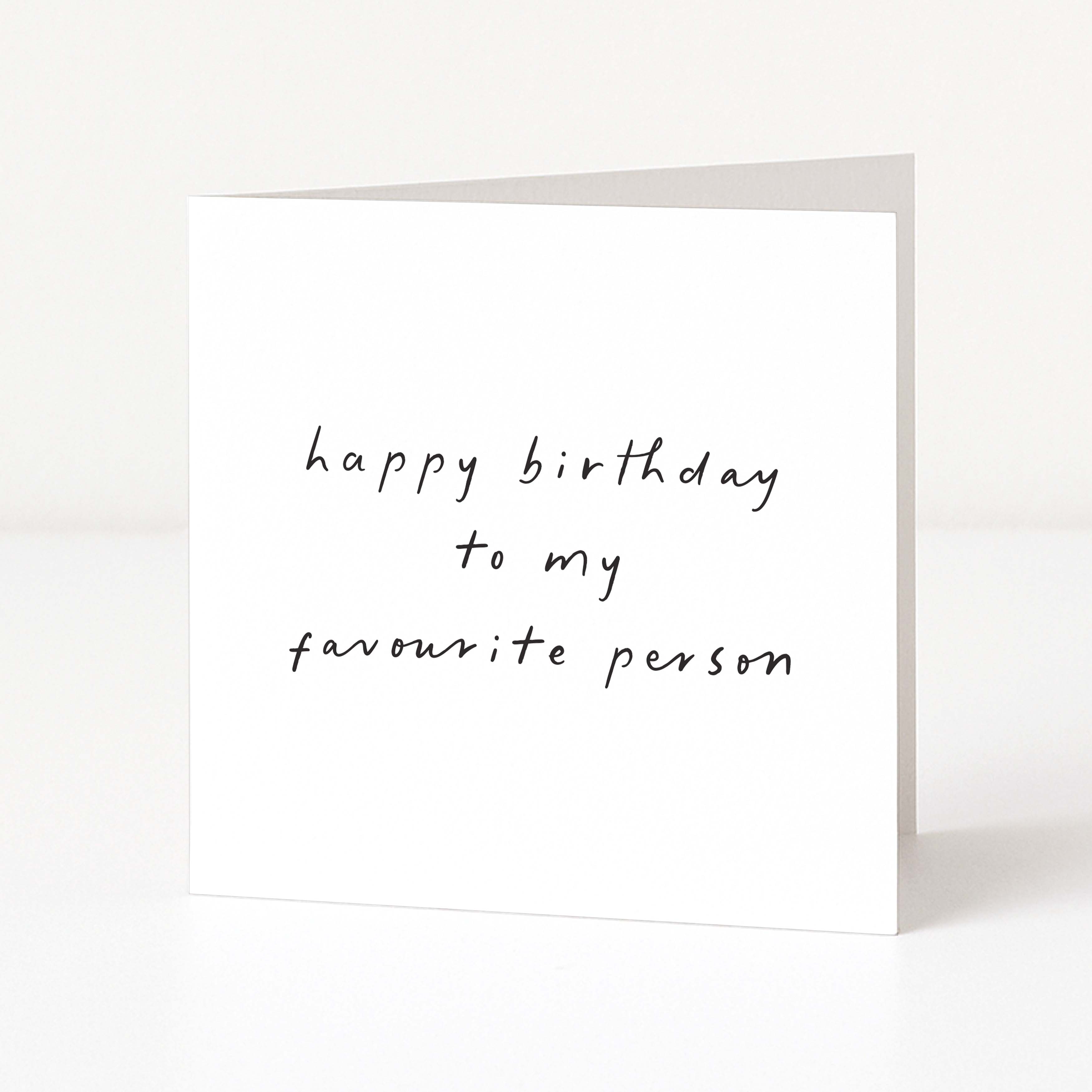 White card with black text 'happy birthday to my favourite person' on a white background
