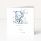 Greeting card with a blue elephant holding a letter 'R' on a white background