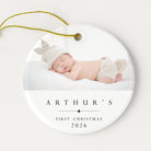 Round ornament with a photo of a baby and 'Arthur's First Christmas 2026' text on a white background.