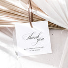 White card with 'Thank you' message and personalization, hanging on dried plants.
