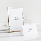 Elegant calligraphy table number for wedding in gold frame