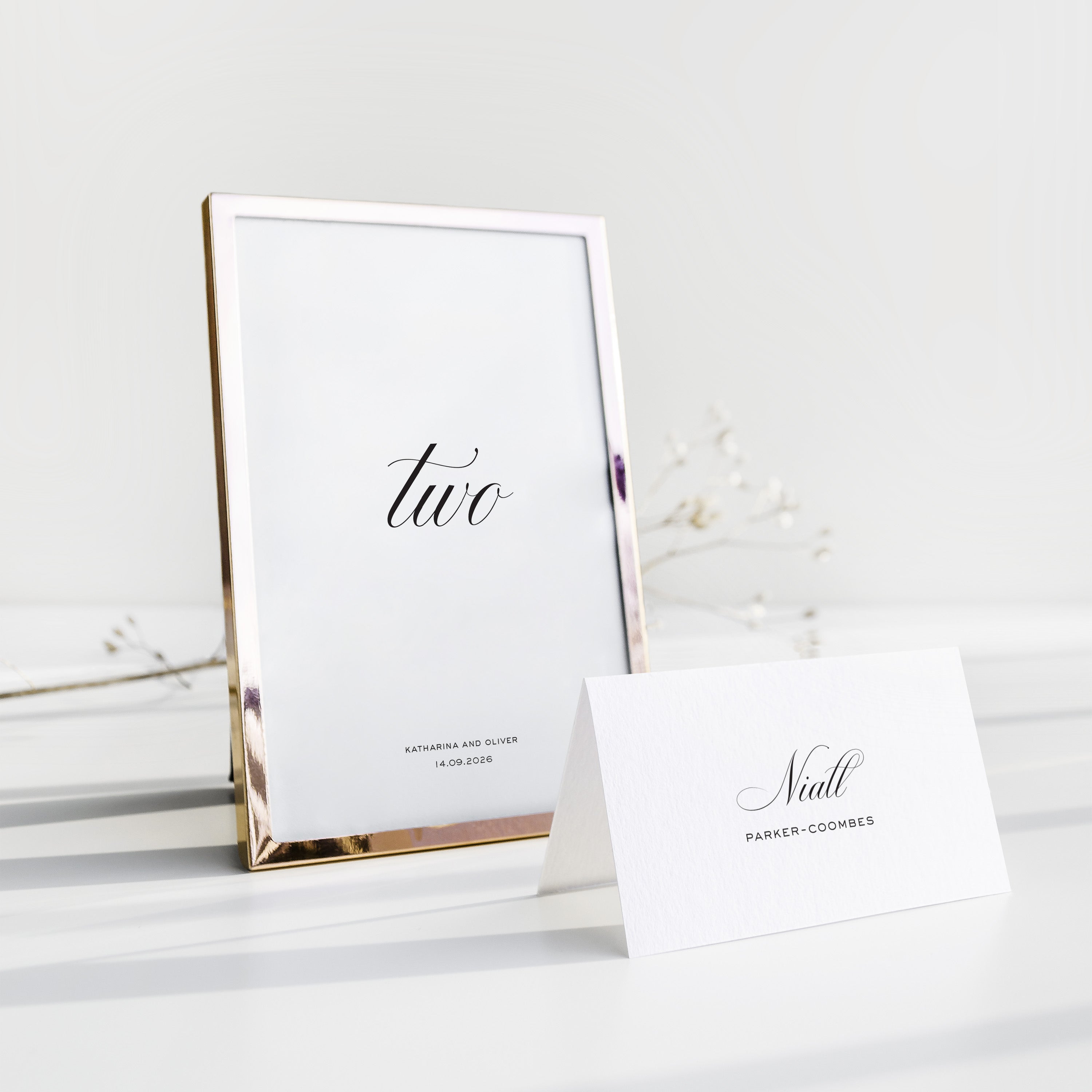 Elegant calligraphy table number for wedding in gold frame