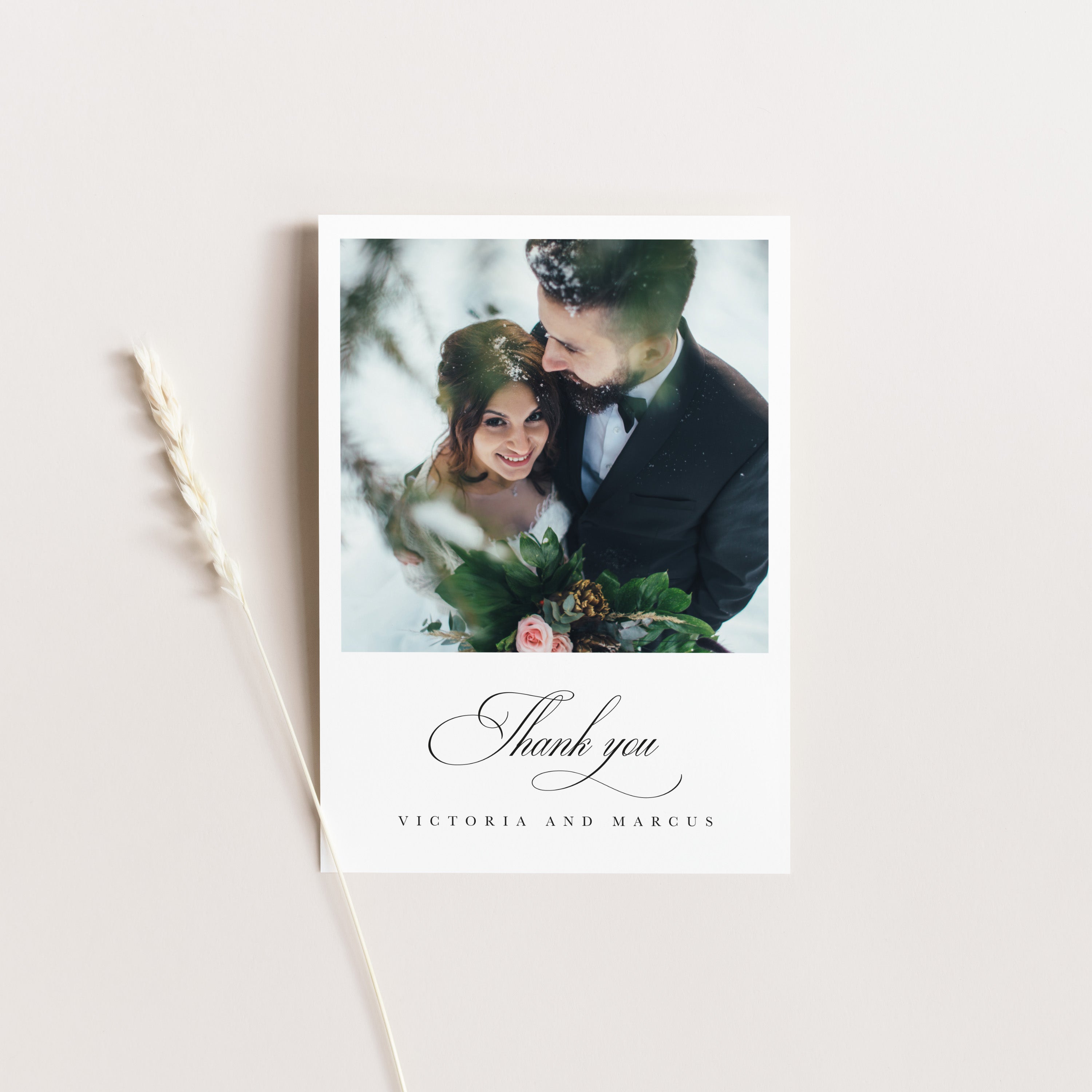 Wedding thank you card with a photo of a couple and the text 'Thank you Victoria and Marcus'.
