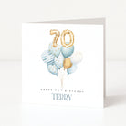 Personalised 70th birthday card for Terry with blue watercolour balloons and gold 70 number balloons.