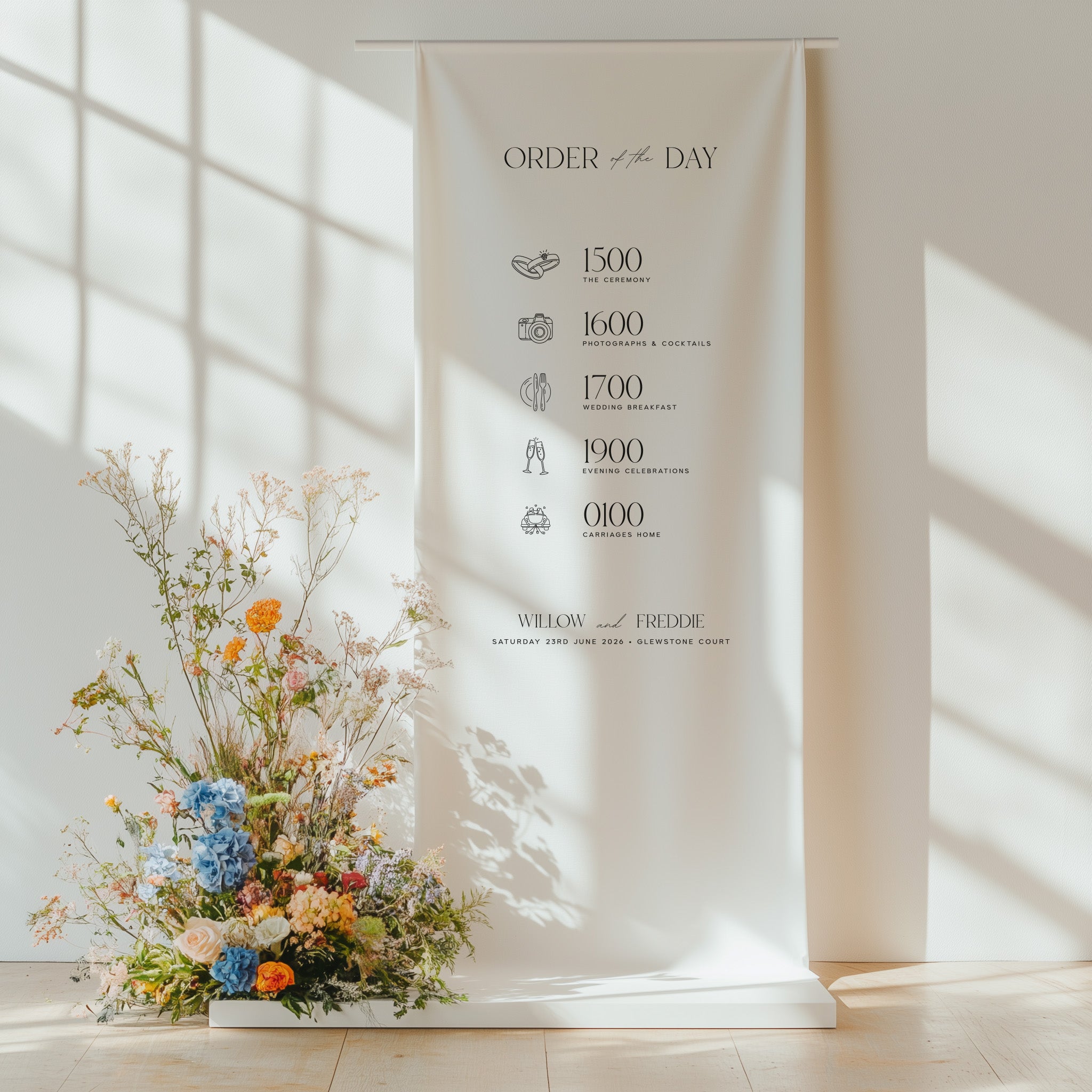 Decorative floral arrangement in front of an 'Order of the Day' banner with timestamps.