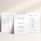 Three wedding signs on a light beige background