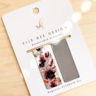 Burgundy Magnetic Bookmark with floral decal on white cardstock. 