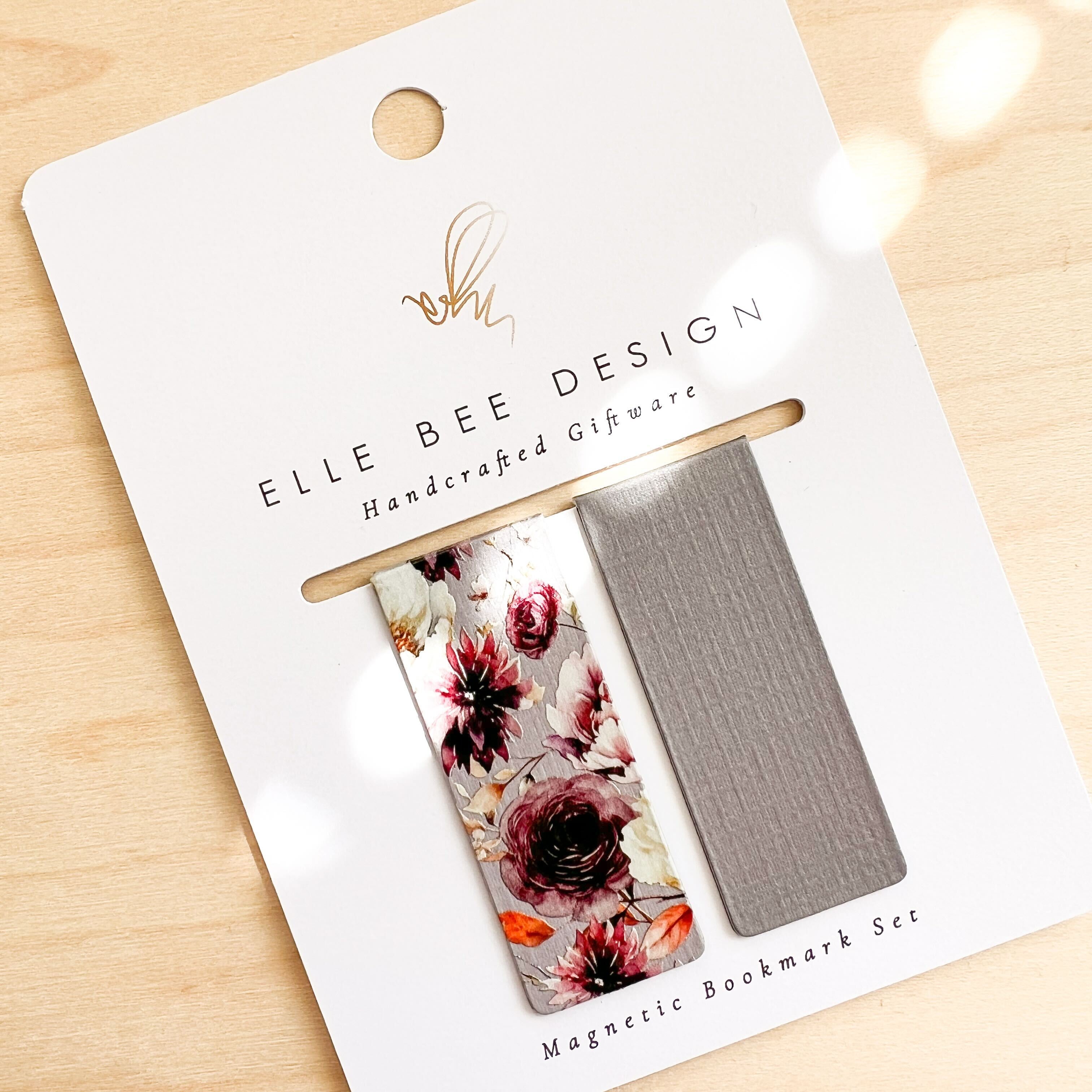 Burgundy Magnetic Bookmark with floral decal on white cardstock. 