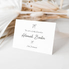 Whimsical seat reservation folded card with handwritten font and ribbons