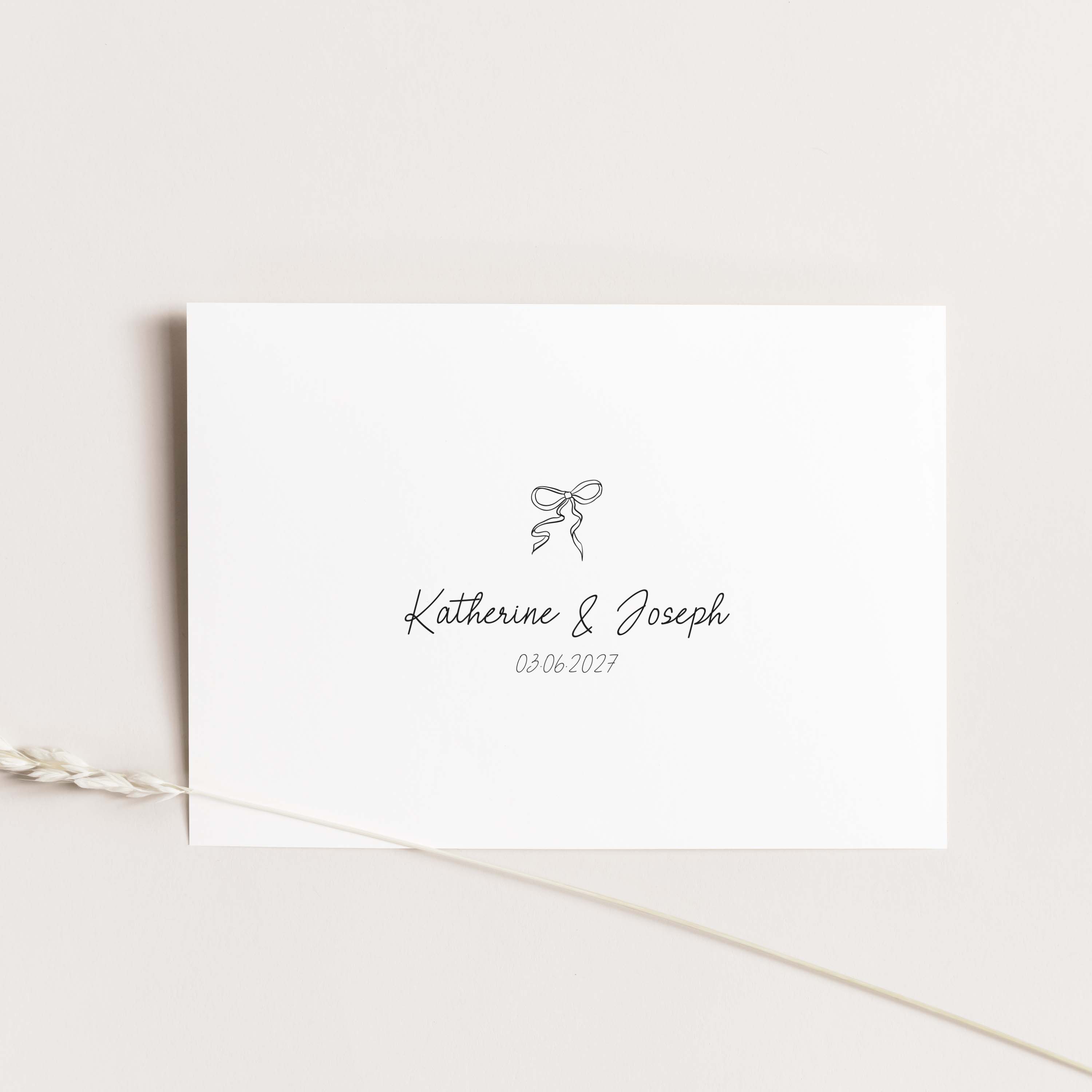 A white rectangular wedding thank you card with a minimalist black bow illustration and the names Katherine & Joseph, plus the date 03.06.