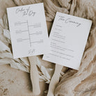 Romantic wedding programme paddle fan with wooden handles and on a natural background