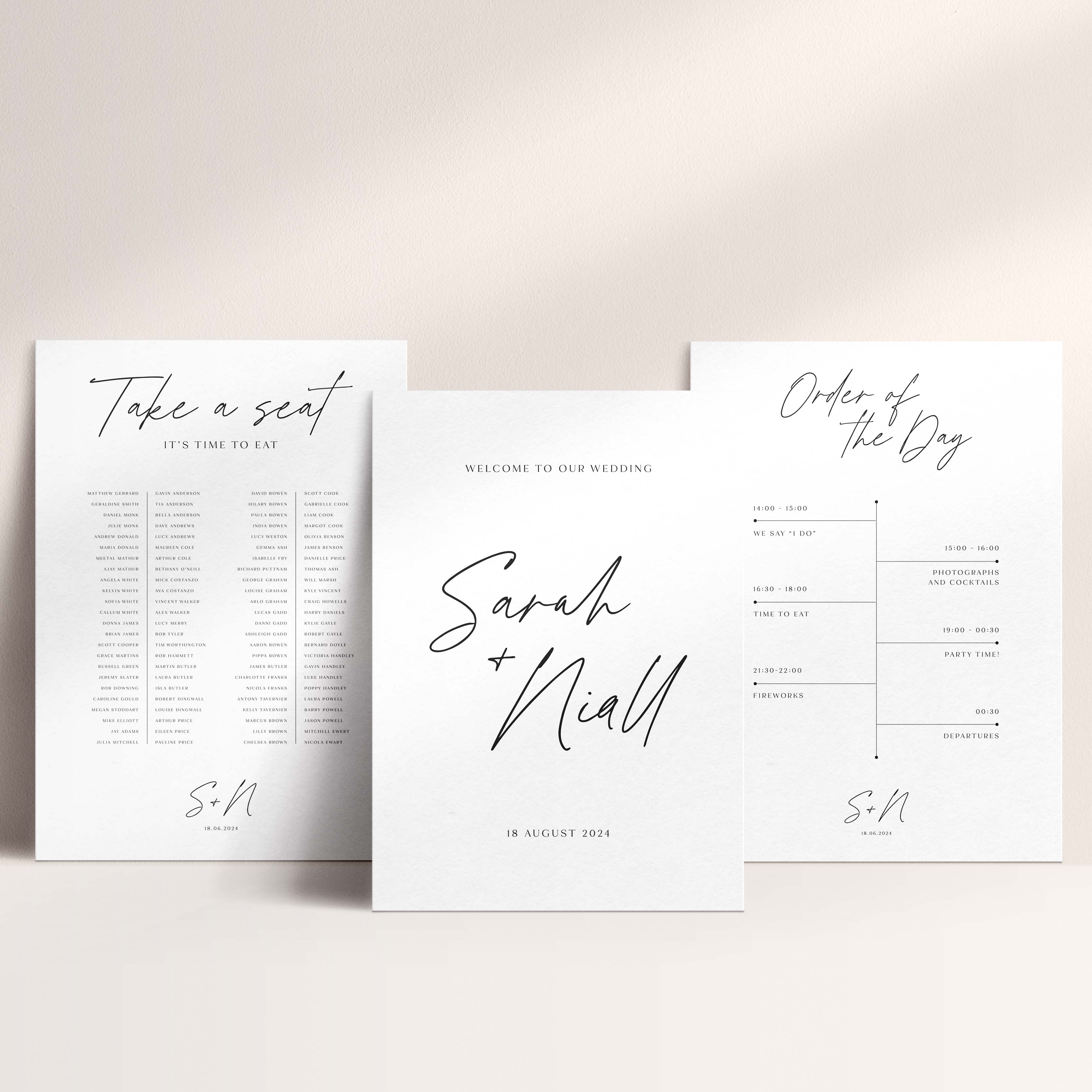 Three wedding signs - table plan, welcome sign and order of the day sign -  on a light background