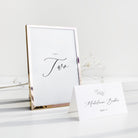 Framed print with 'Table Two' text on a white surface