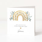 Christening card with gold rainbow and floral design on a white background