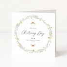 Christening card with floral wreath design and personalised text on a white background