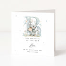 Christening card for a boy with an elephant illustration and personalized text on a white background